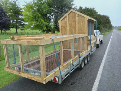 A chicken coop on the road.