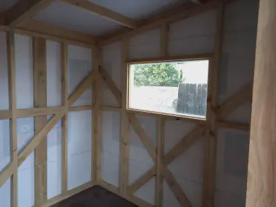 Inside a sturdy Tom Good garden shed.